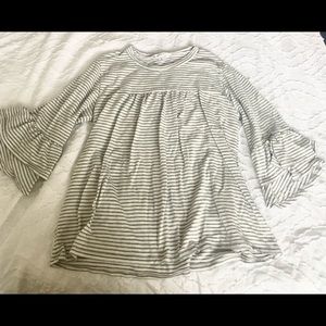 Cute gray and white striped shirt size M with a cute sleeve.